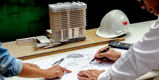 Design blueprints and laptop